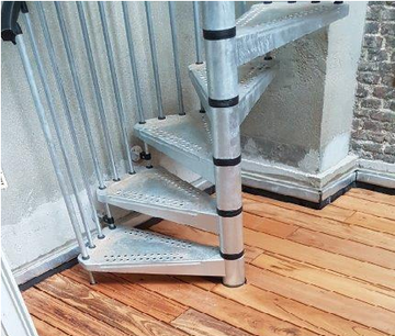 escalier colimaçon en métal électrozingué - fixation au sol et mur